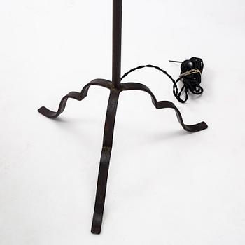 Harald Notini, a pair of wrought iron floor lamps, model '15101', Arvid Böhlmarks Lampfabrik, 1930's.