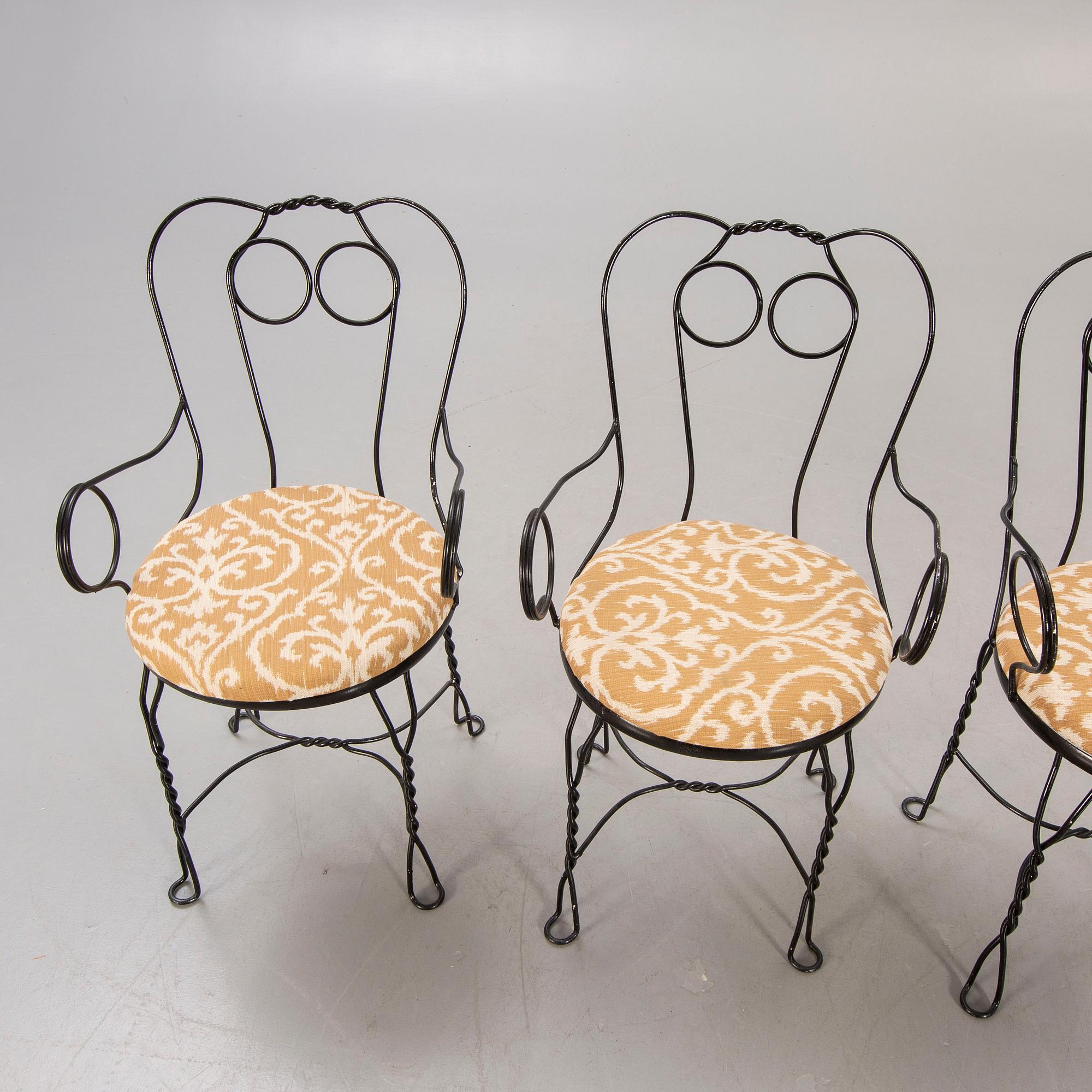 A set of four Grytgöl metal garden chairs mid 1900s.