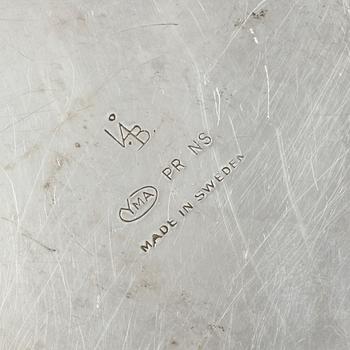 LJUSSTAKAR, ett par, nysilver, "Lilja", Ivar Ålenius Björk, 1900-talets andra hälft.