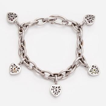 Armband, 18K vitguld med berlocker av hjärtslipade färgstenar och en briljantslipad diamant.