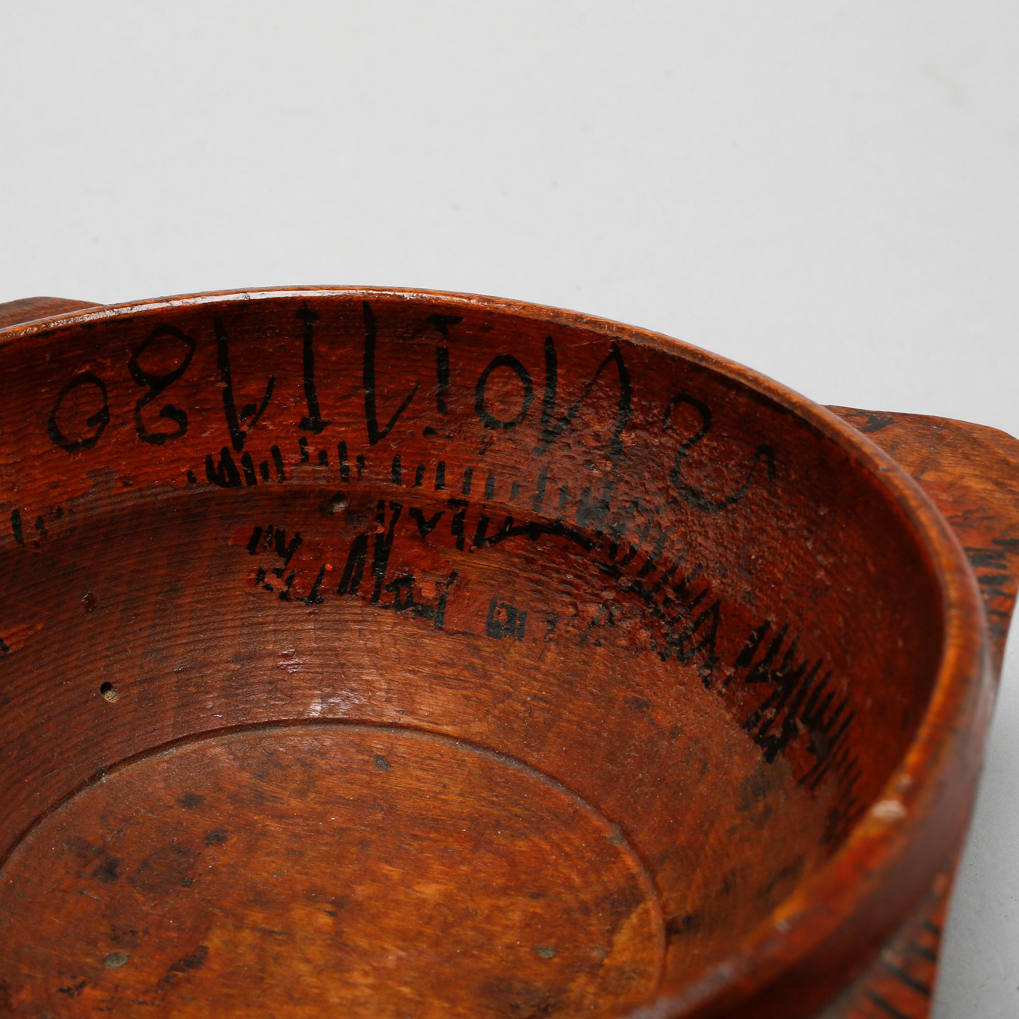 A wooden folk art bowl from 1780.