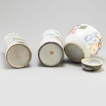 Two Chinese famille rose hat stands and a jar with cover, 20th century.