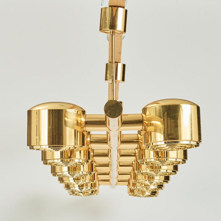 Hans-Agne Jakobsson, a 12 lights brass ceiling lamp, model 746/12, Markaryd, Sweden, 1960-70's.