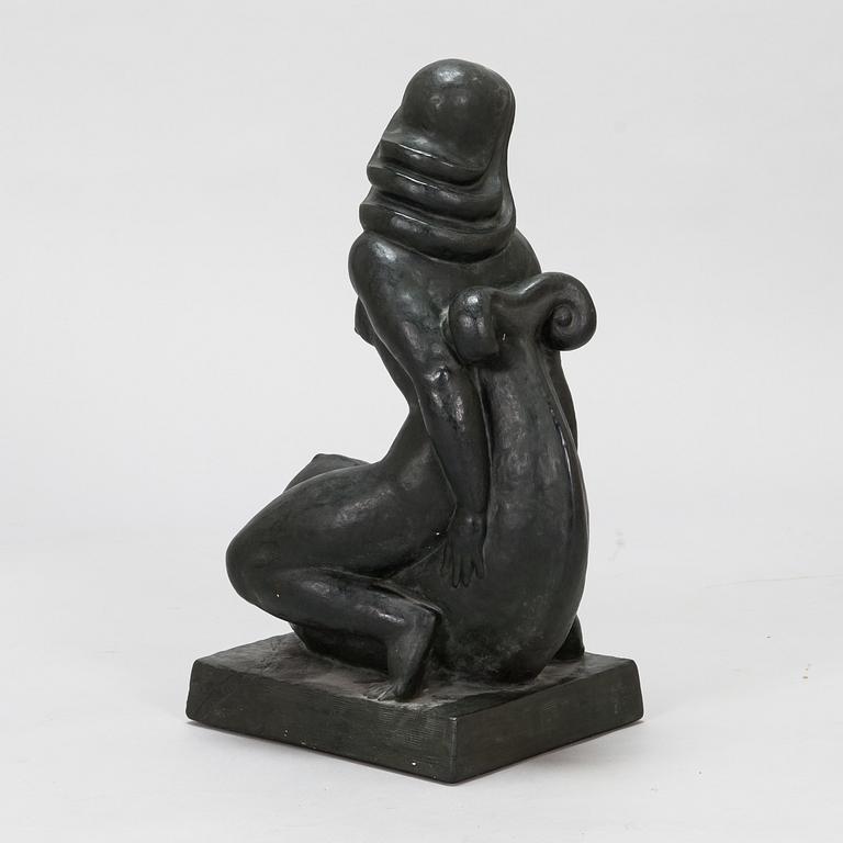 Ivar Johnsson, a painted plaster sculpture, signed.