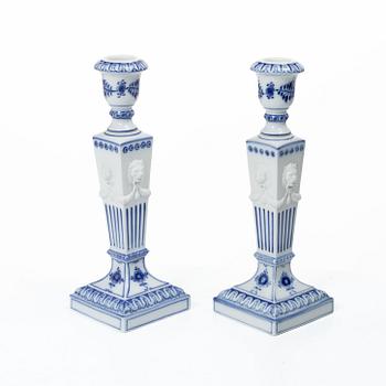 Royal Copenhagen, Candlesticks, a pair, porcelain, "Musselmalet", Denmark, 1935–1936 & 1980–1984.