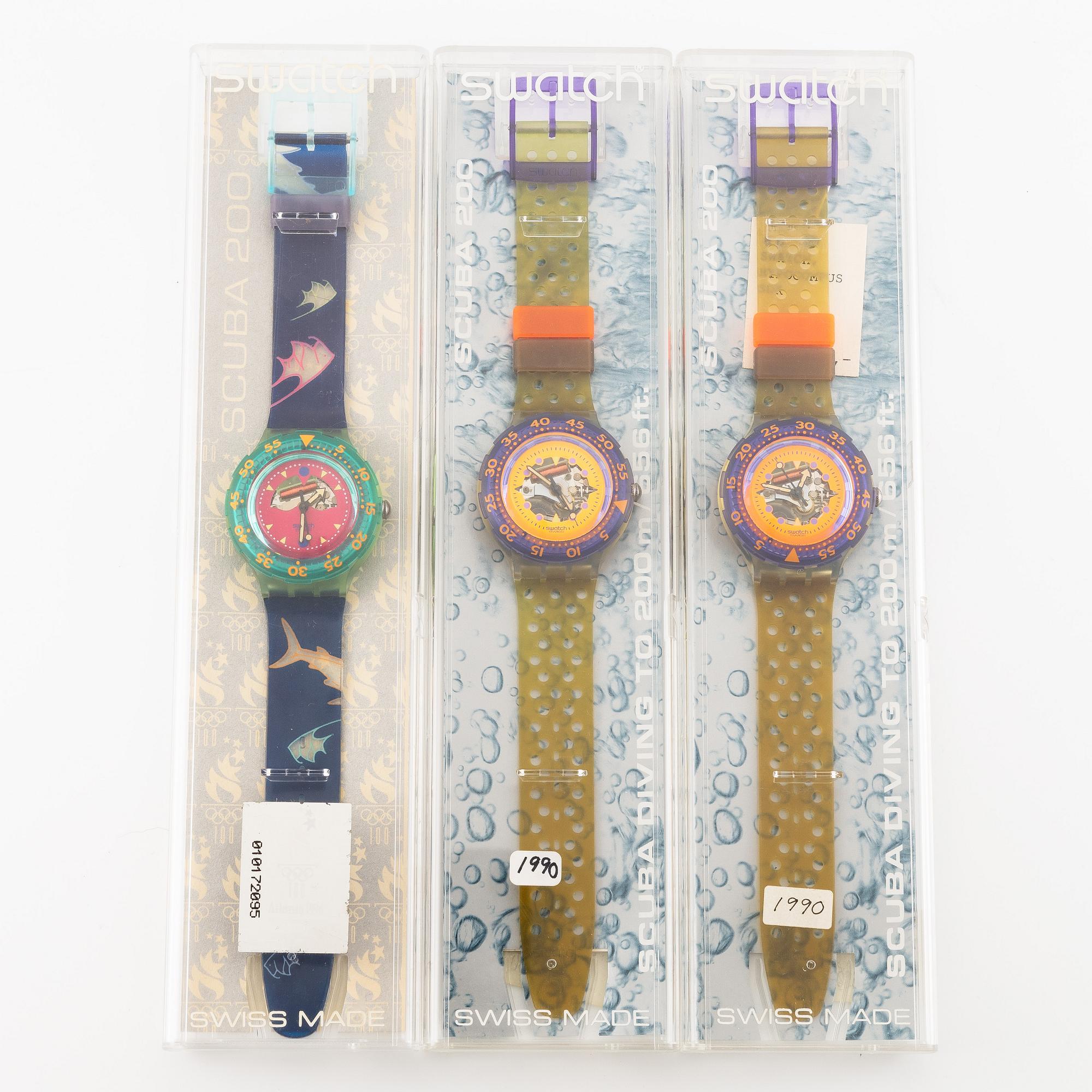Parti med 21 Swatch-klockor, gummiband och klocklitteratur, "No Reserve".