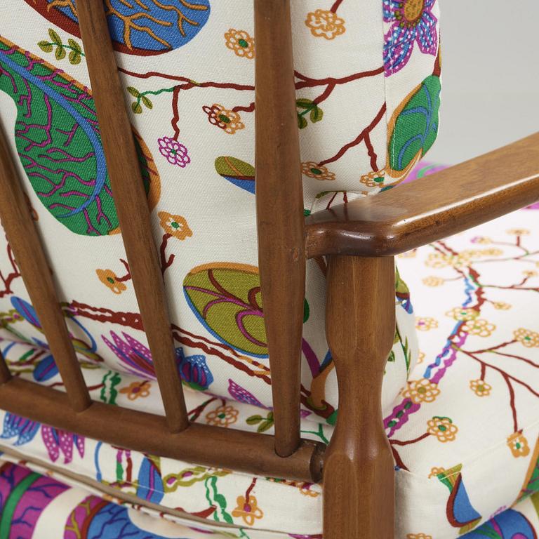 A pair of Josef Frank mahogany armchairs for Svenskt Tenn, model 891.