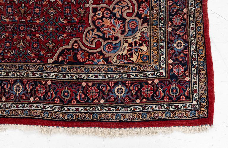 An old Bidjar rug, c. 225 x 143 cm.