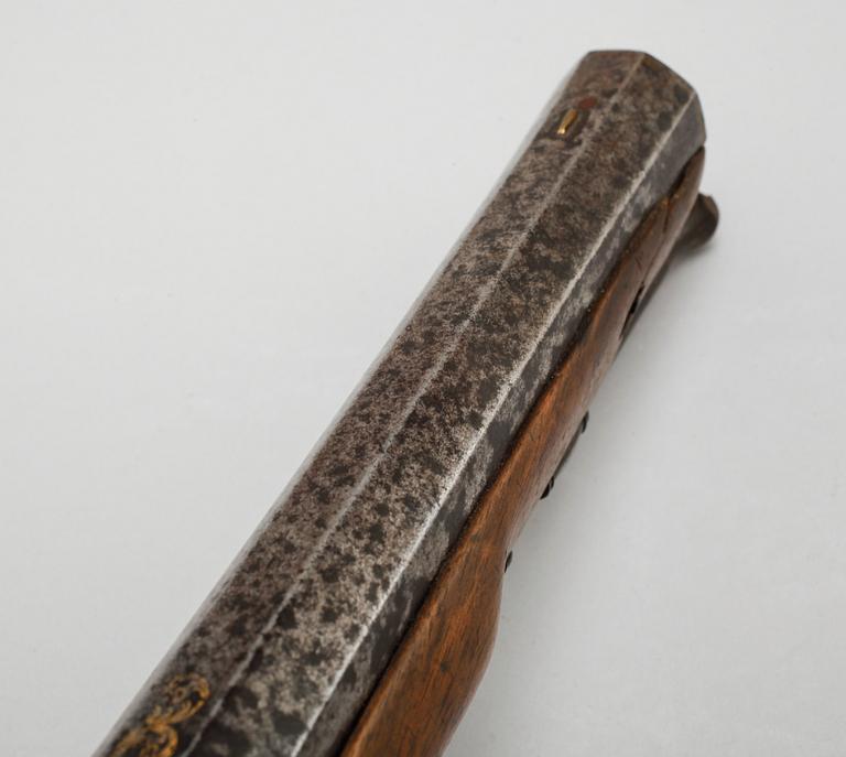 A pair of percussion guns, around the mid 19th century.