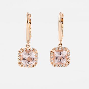 A pair of 14K gold earrings with faceted morganites and round brilliant-cut diamonds.