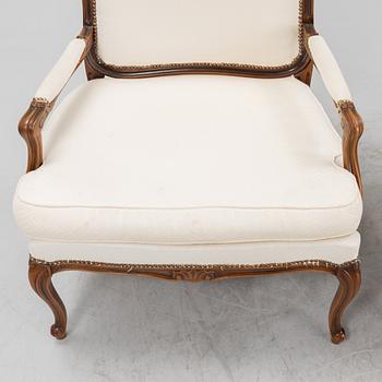 A pair of Rococo style armchairs, later part of the 20th century.