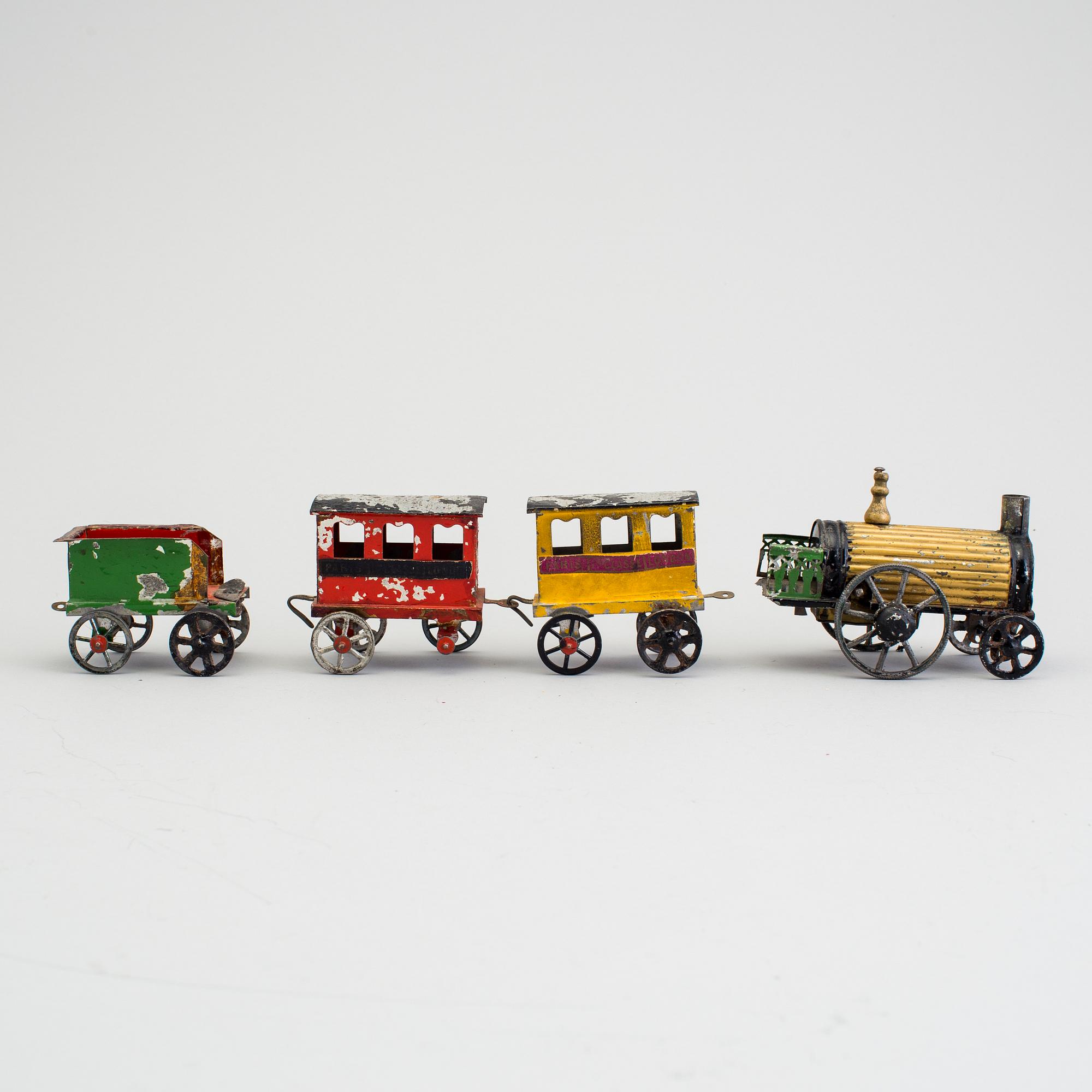 A tinplate train set by E.F. Lefevre, France, ca 1877-1885.