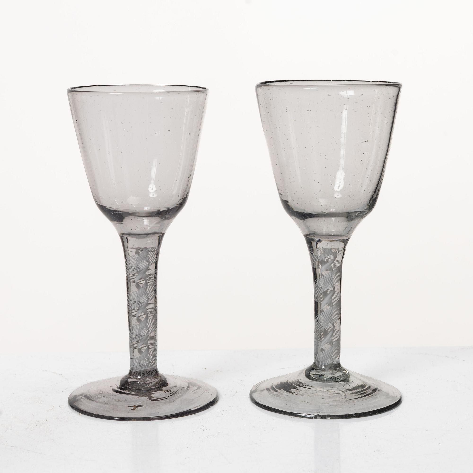 Three spiral-stemmed glasses, 18th Century.