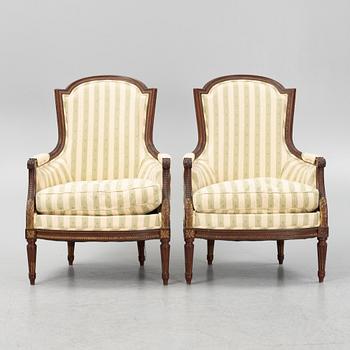 A pair of bergère armchairs, Louis XV style.