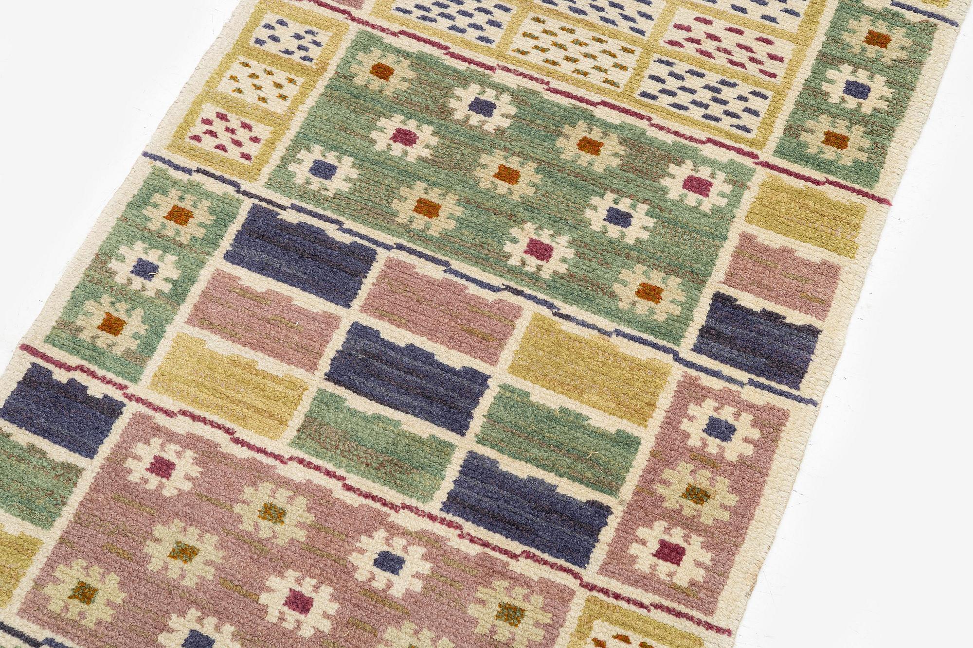 Märta Måås-Fjetterström, a 'Ängarna' carpet, knotted pile, c. 190 x 90 cm, signed AB MMF.
