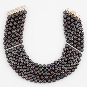 Necklace, five-row with cultured black pearls, 18K gold and white gold with brilliant-cut diamonds.
