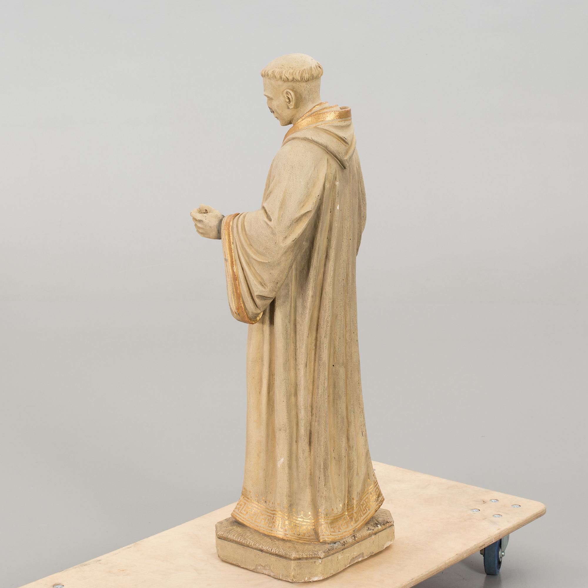 A Dutch concrete sculpture marked J van den Broeck Antwerpen 1907.