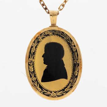 Pendant in 18K gold with silhouette portrait, 19th century.