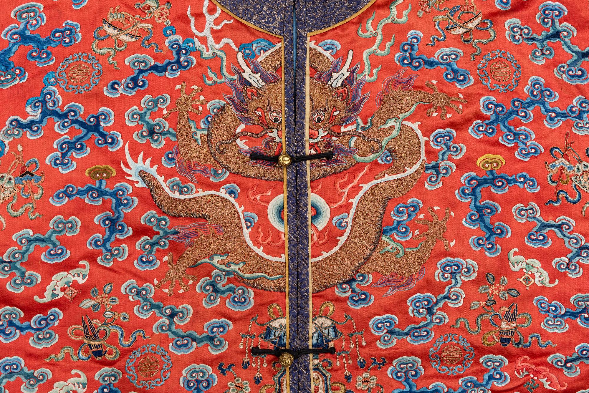 A Chinese embroidered silk robe, late Qing dynasty, 19th century.