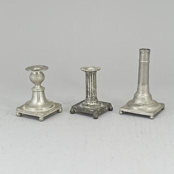 Three 19th century gustavian pewter candlesticks.
