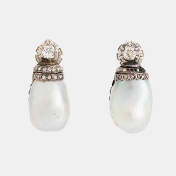 348. A pair of silver and pearl earrings set with old- and rose-cut diamonds.