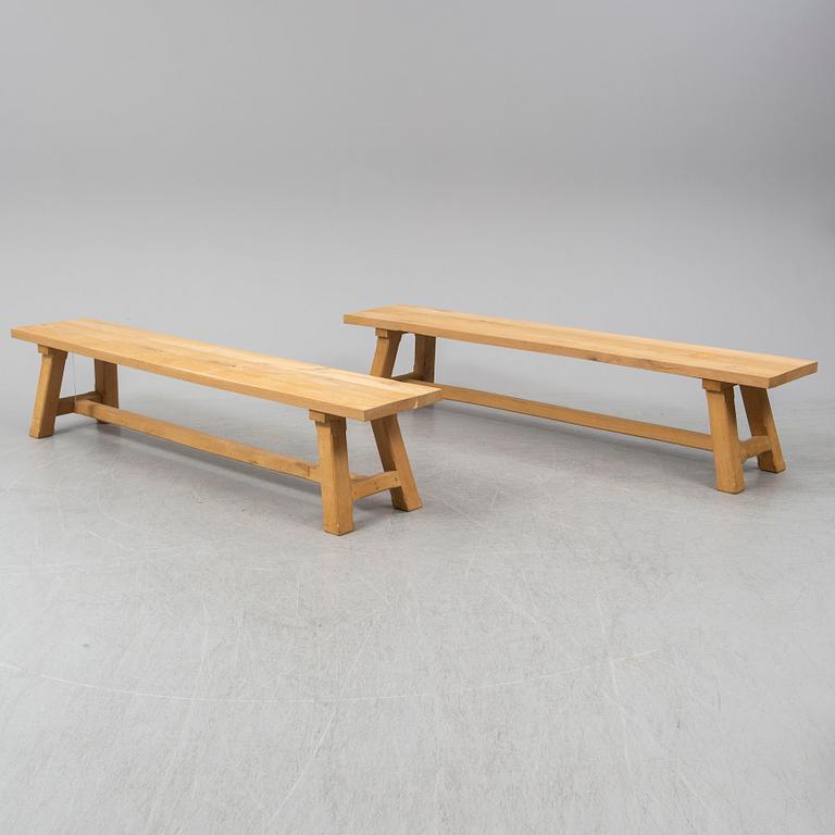 A contemporary oak table and two benches from Garbo Interiors.