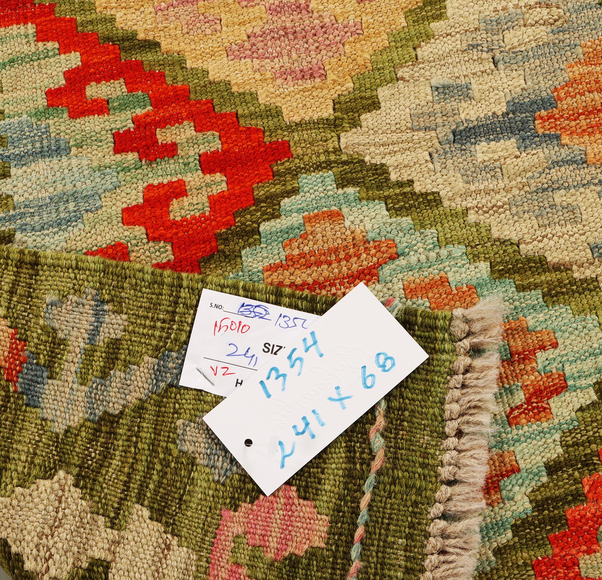 A runner carpet, kilim, c. 241 x 68 cm.