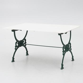 Garden bench, armchair and table, 20th century.