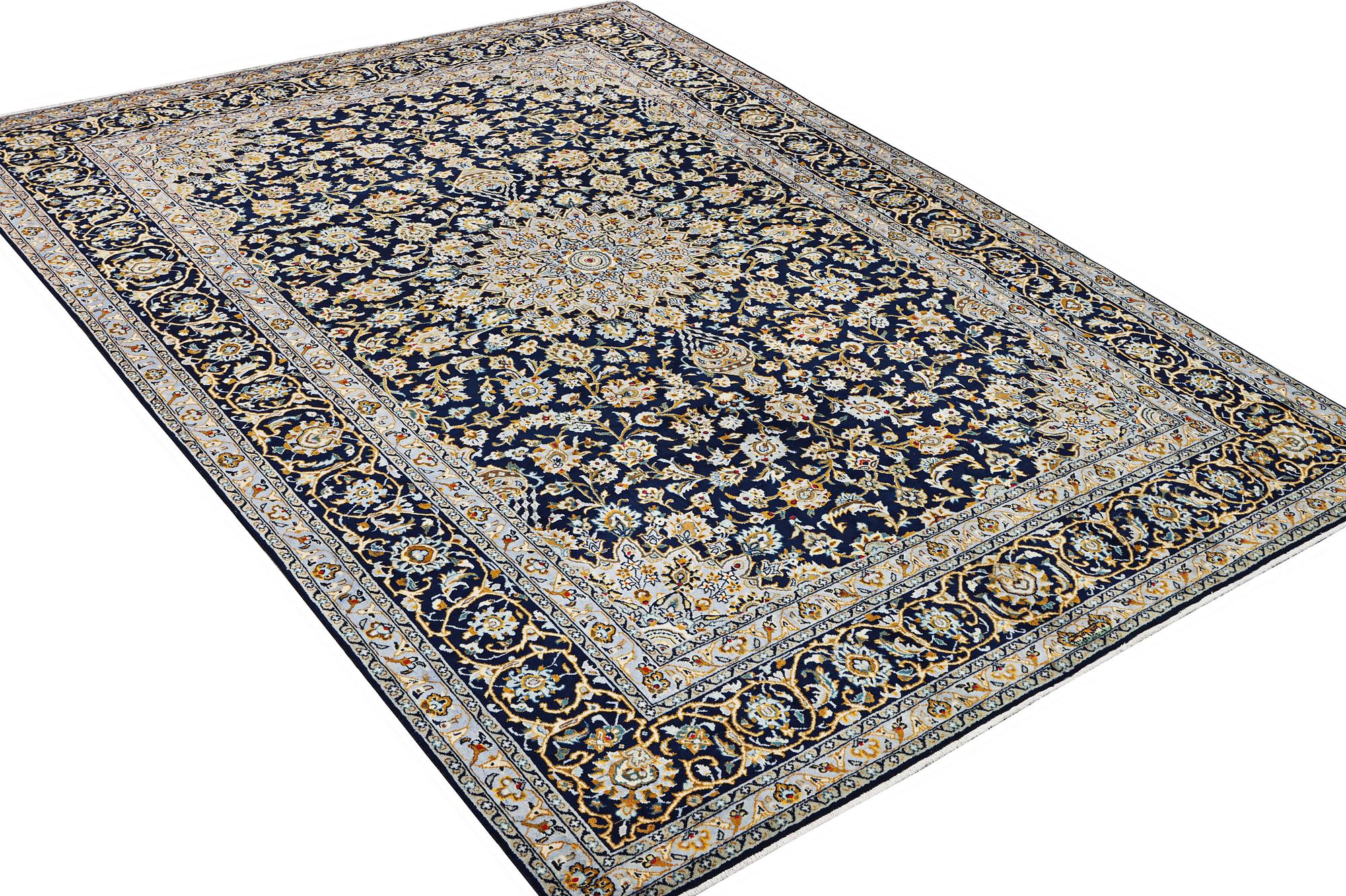 A Kashan carpet, c. 343 x 236 cm.