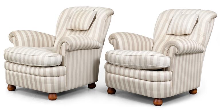 A pair of Josef Frank easy chairs, by Svenskt Tenn, model 336.