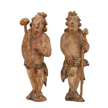 616. A pair of Baroque oak sculptures.