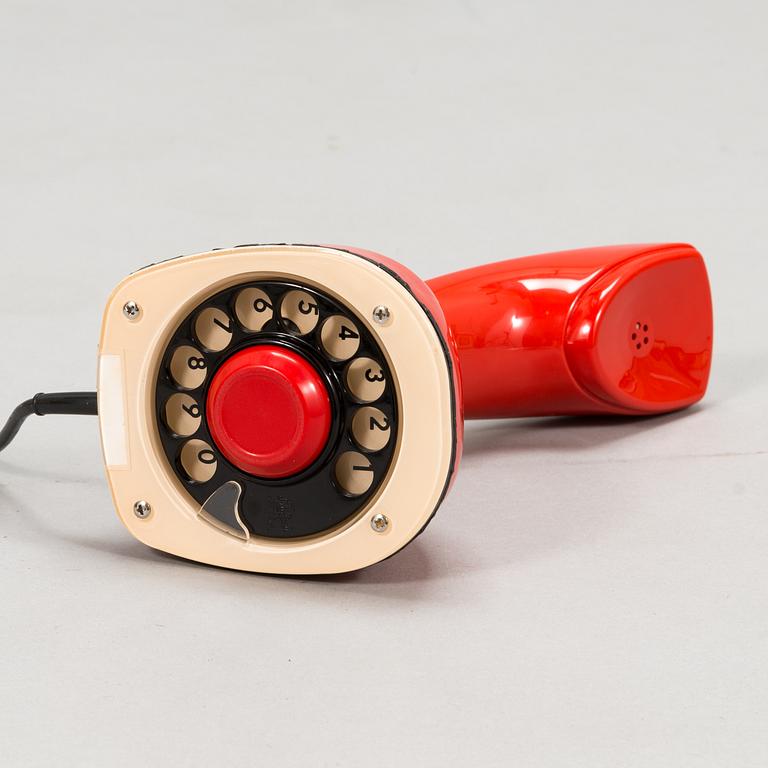 An interior set in red plastic from the 1970s, 7 parts.
