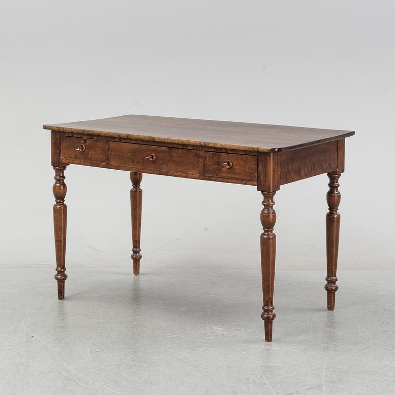 An early 20th Century birch writing desk.