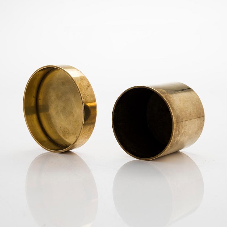Maija Heikinheimo, a set of two mid-20th century brass jars, manufacturer Valaistustyö for Artek.
