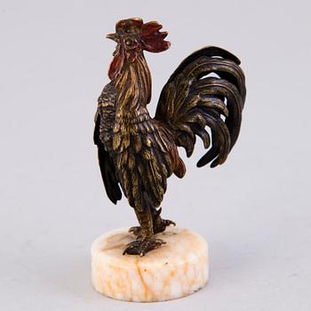 A MINIATURE SCULPTURE, painted bronze, early 20th century.