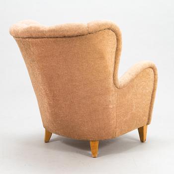 A 1950s armchair.