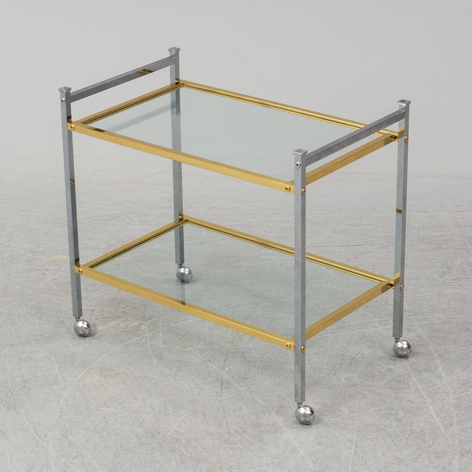 A metal and glass drinks trolley, 1970's/80's.