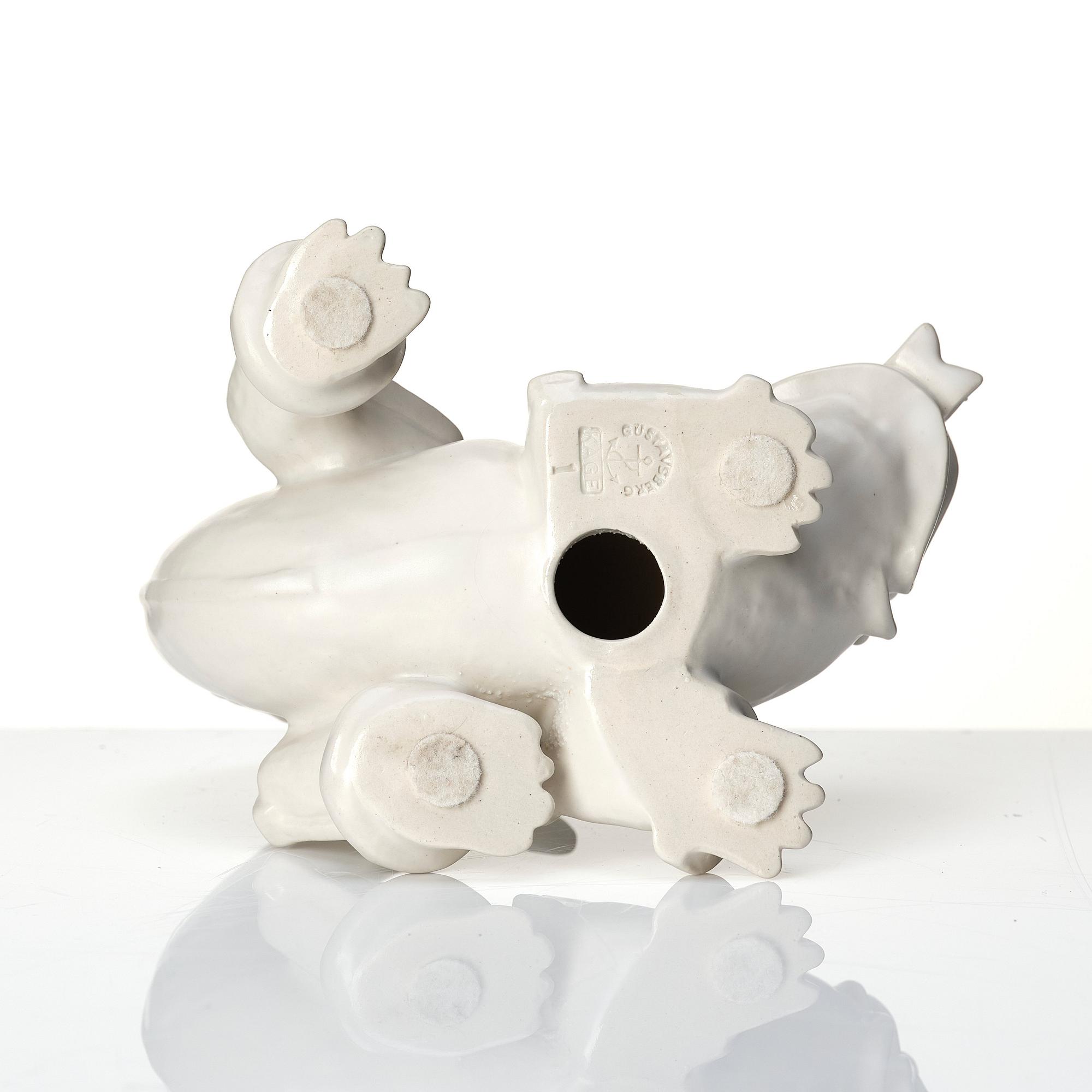 Wilhelm Kåge, a stoneware sculpture of a dragon puppy, Gustavsberg, Sweden 1940-1950s.