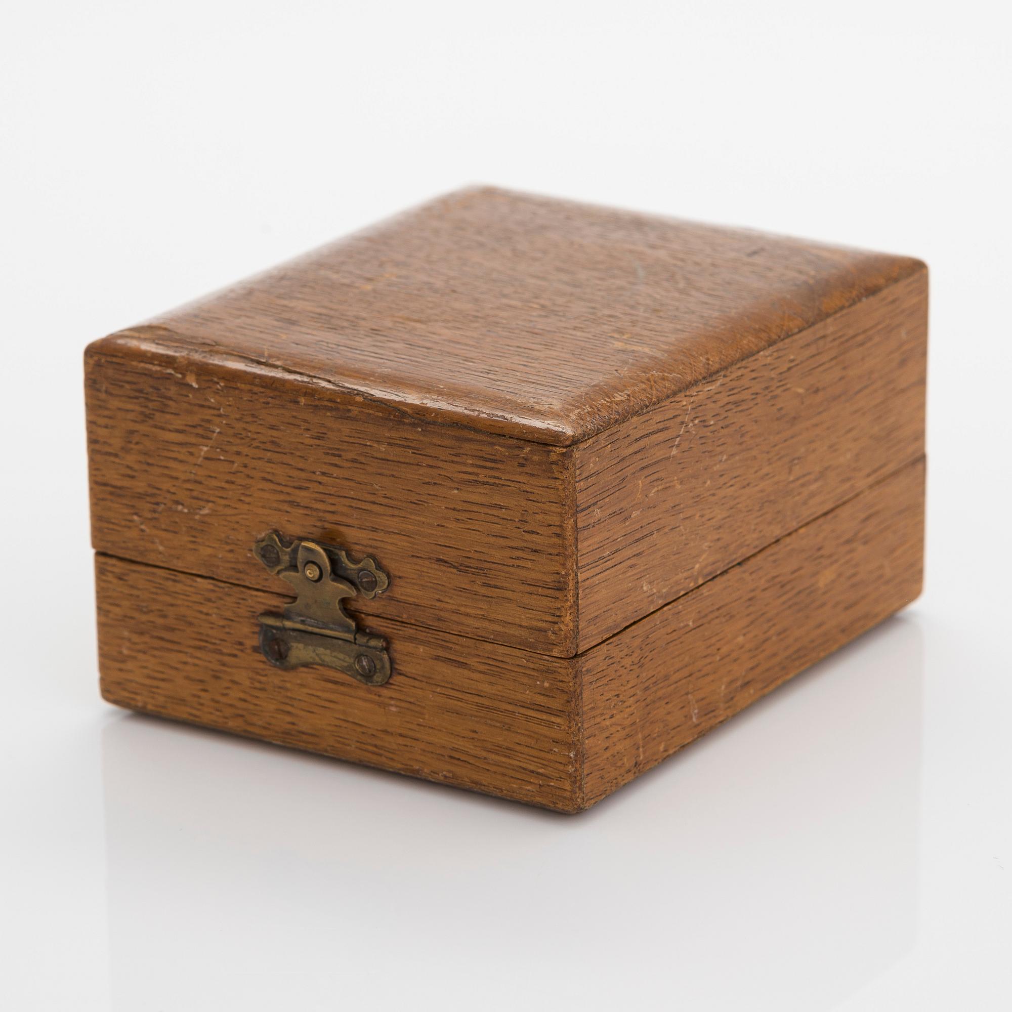 Alexander Fuld, a parcel-gilt beaker, Moscow 1895. In an oak case marked I.E. Morozov St. Petersburg.