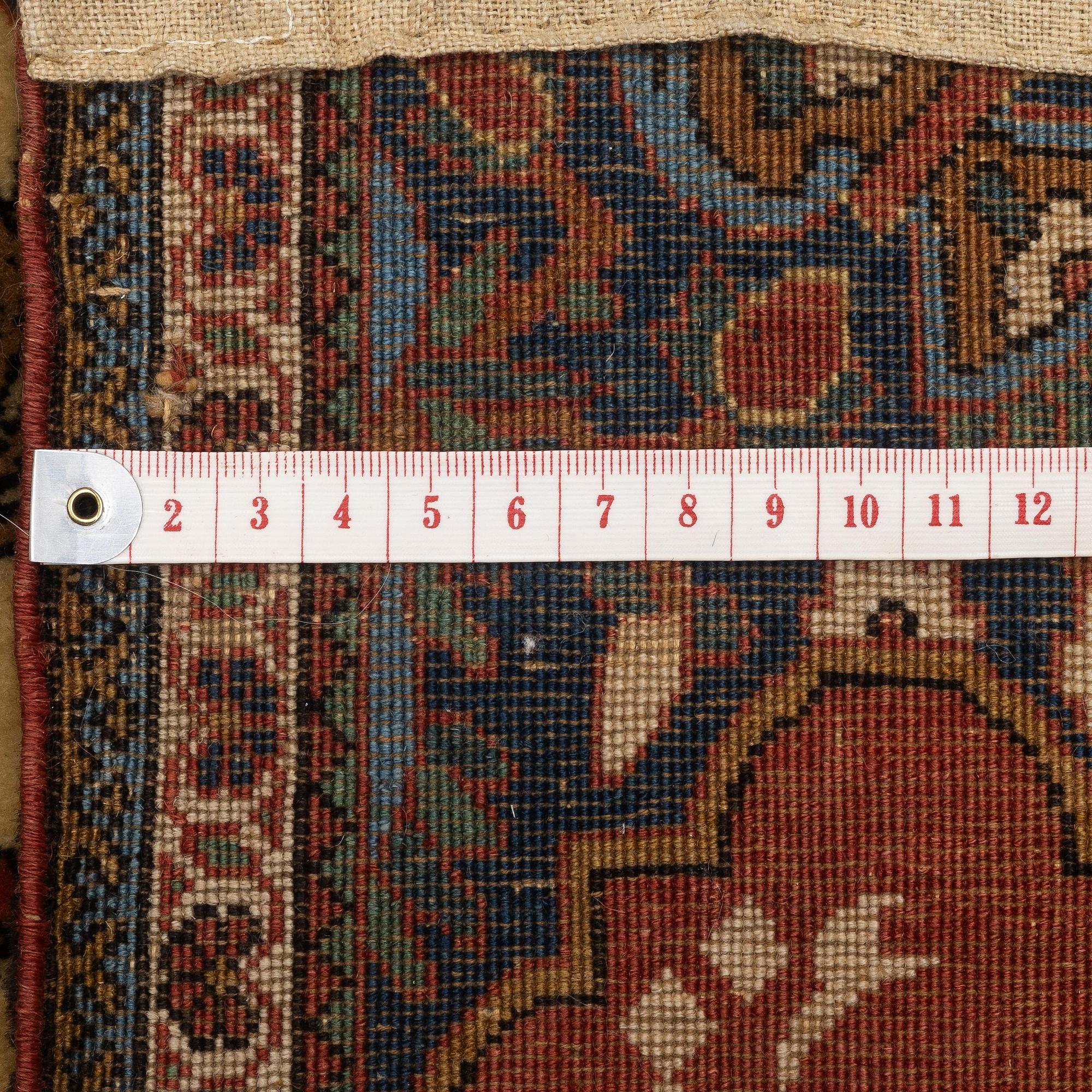 A Kashan 'Mohtasham' rug, c. 198 x 131 cm.