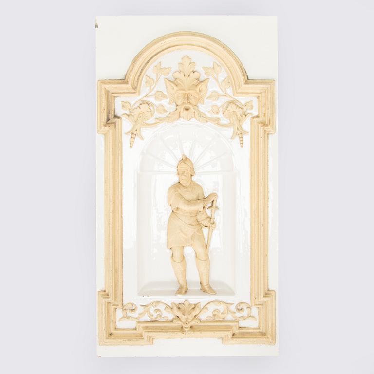 Reliefi / koriste-elementti kakluuniin Wilhelm Andstén, Helsinki, 1800-luvun loppu.