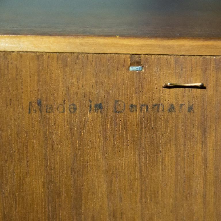 A Danish 1950s-60s cabinet with bar compartment.