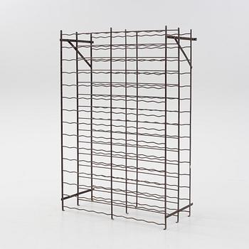 A Rigidex iron wine rack, France.