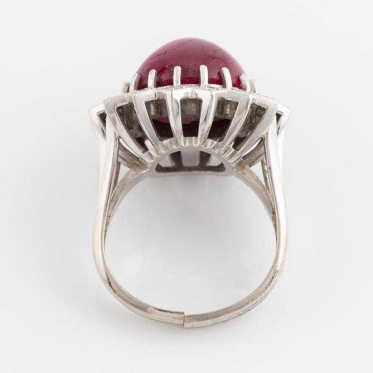 Ring, Strömdahls, with a cabochon-cut ruby and brilliant cut diamonds.