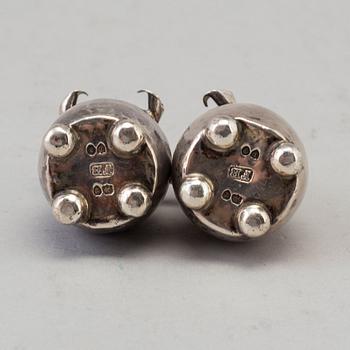 A PAIR OF SILVER CASTERS by Frederick Brasted, London 1876.