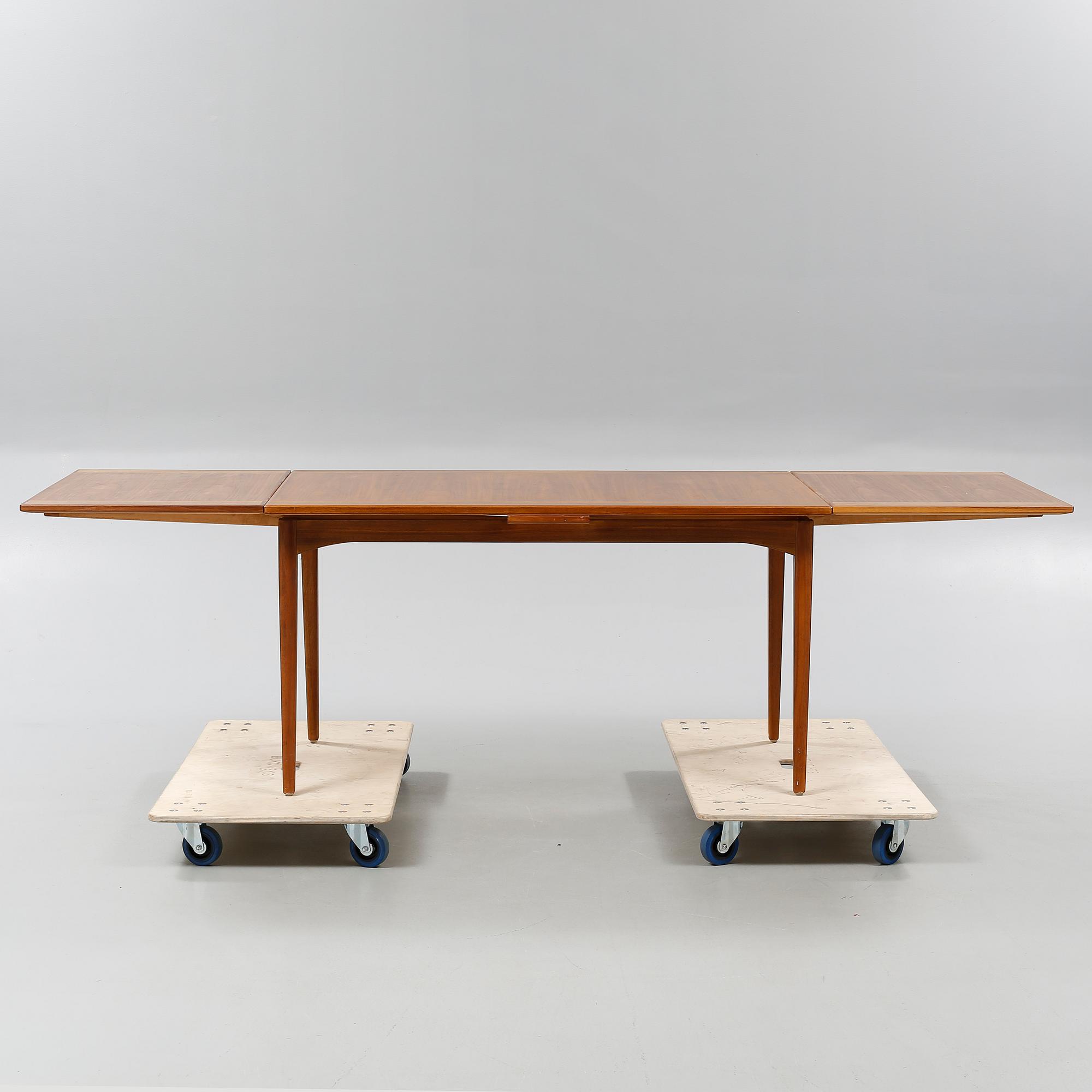 A dinner table by CARL MALMSTEN, "Calmare Nyckel", second half of the 20th century.