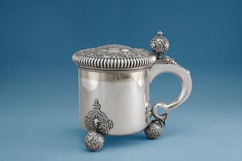 464. A TANKARD, silver. C.G. Hallberg Stockholm 1893. Height 20 cm, weight 1100 g.