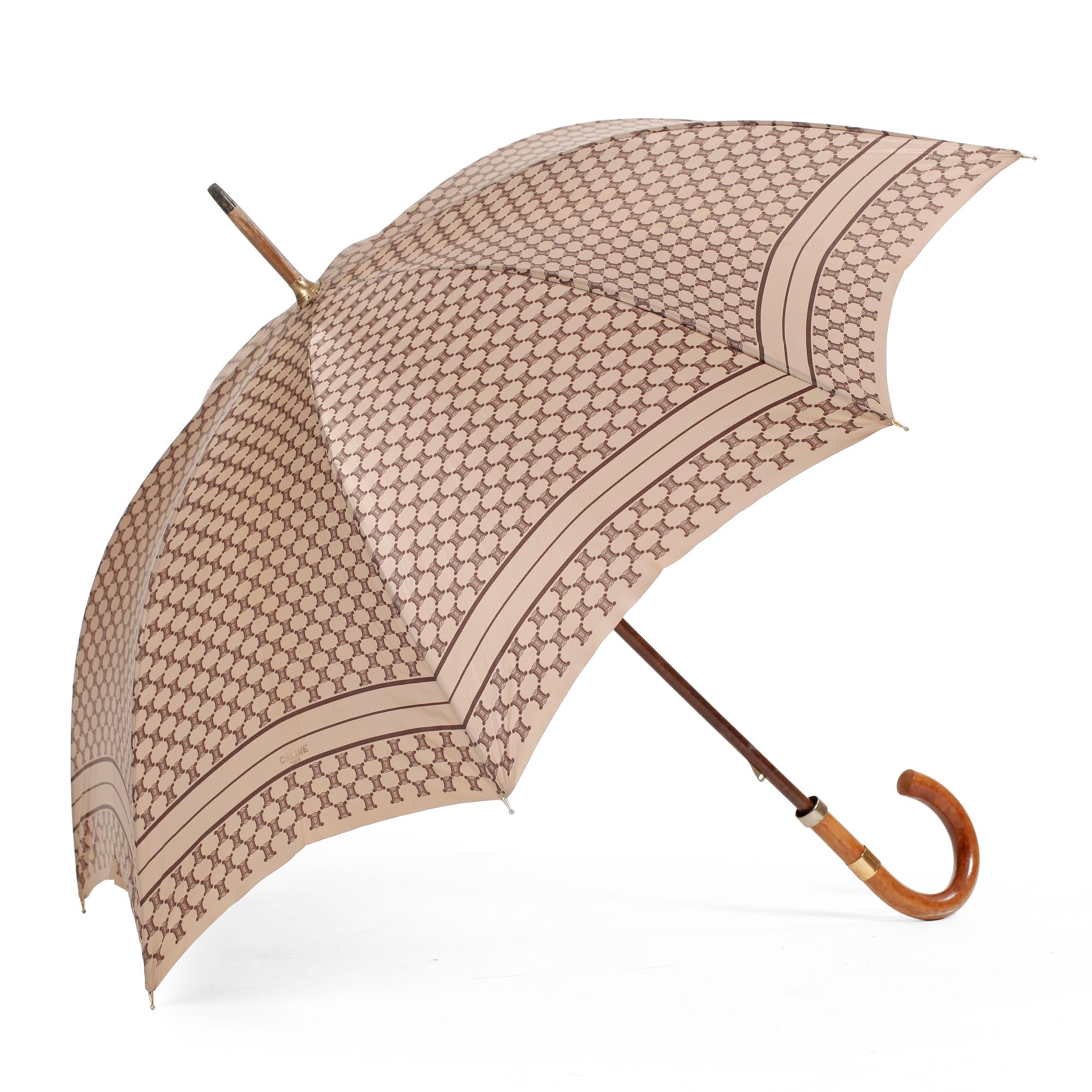 CÉLINE, a beige monogram umbrella.