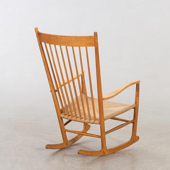 Hans J Wegner, gungstol, "J 16". FDB Möbler, 1900-talet sandra hälft.