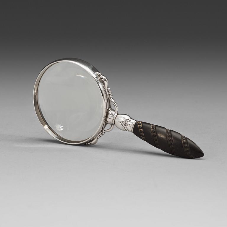 A Georg Jensen sterling and ebony magnifying glass, Copenhagen 1933-44.